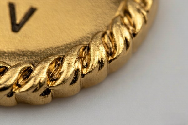 Macro close-up of a rope edge texture on a challenge coin